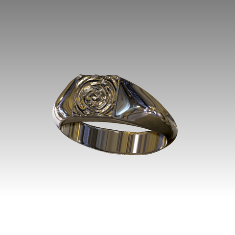 Gold ring with a rose design on a gray background